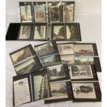 An album containing approx. 75 assorted vintage postcards.