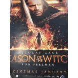 A large plastic film advertising poster for "The season Of The Witch" starring Nicholas Cage 2011.