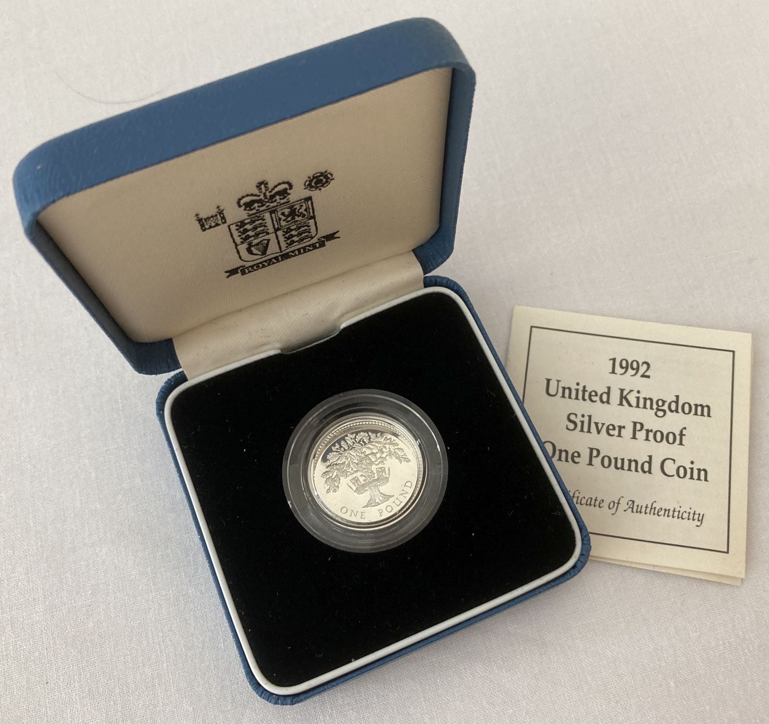 A boxed Scottish 925 silver £1 coin dated 1992 with COA.