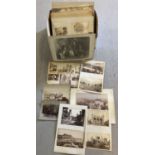A box containing a quantity of Victorian albumn photographs.