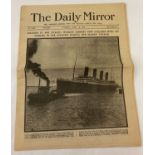 A copy of The Daily Mirror newspaper featuring the sinking of The Titanic.