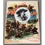 A reproduction "Buffalo Bill" advertising poster on a mount and framed.