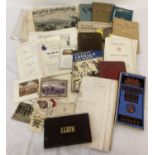 A box of assorted vintage ephemera.