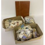 2 boxes of loose stamps to include British and foreign stamps.