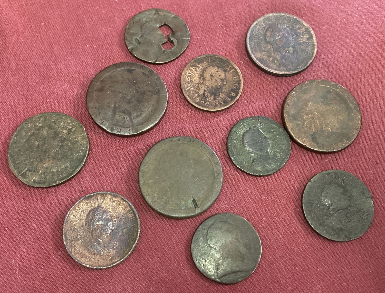 A small collection of Georgian pennies and half pennies to include 3 cartwheel pennies.