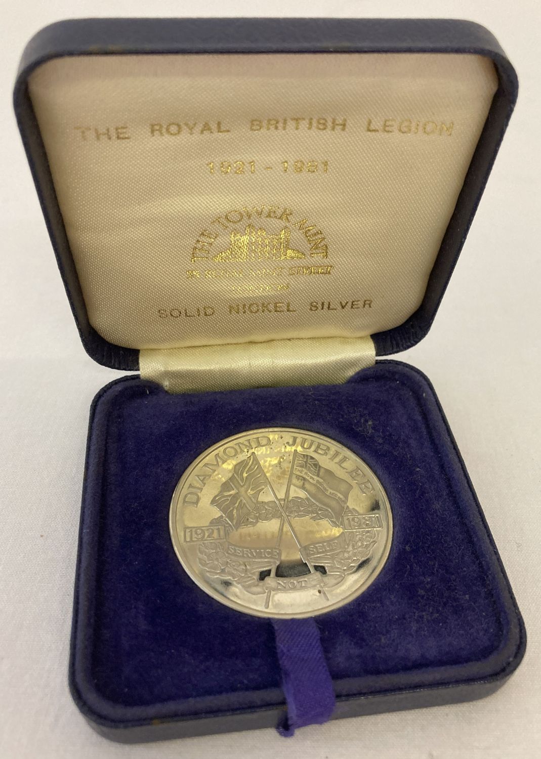A boxed Royal British Legion Diamond Jubilee 1921-1961 commemorative medal.