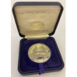A boxed Royal British Legion Diamond Jubilee 1921-1961 commemorative medal.