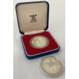 2 x 1977 Jubilee silver crown coins. One in clear base and boxed the other in clear case.