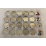 41 collectable and commemorative 50p coins in a sectional plastic case.