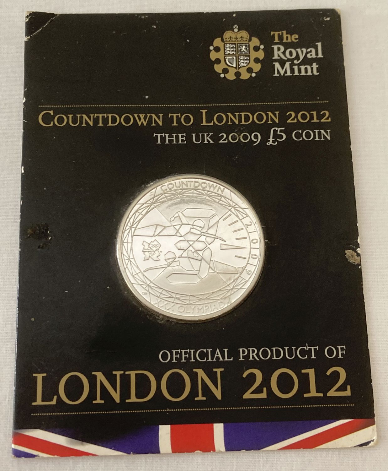 A blister packed "Countdown To London 2012" 2009 £5 coin. Issues by the Royal Mint.