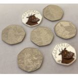5 Paddington Bear issue 50p Coins and 2 uncirculated 2019 Gruffalo 50p coins with coloured decals.