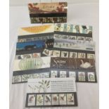 8 Royal Mail collectors stamp sets, with information cards, relating to wildlife and seasons.