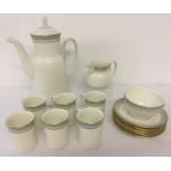 A Royal Doulton coffee set in "Berkshire" pattern.