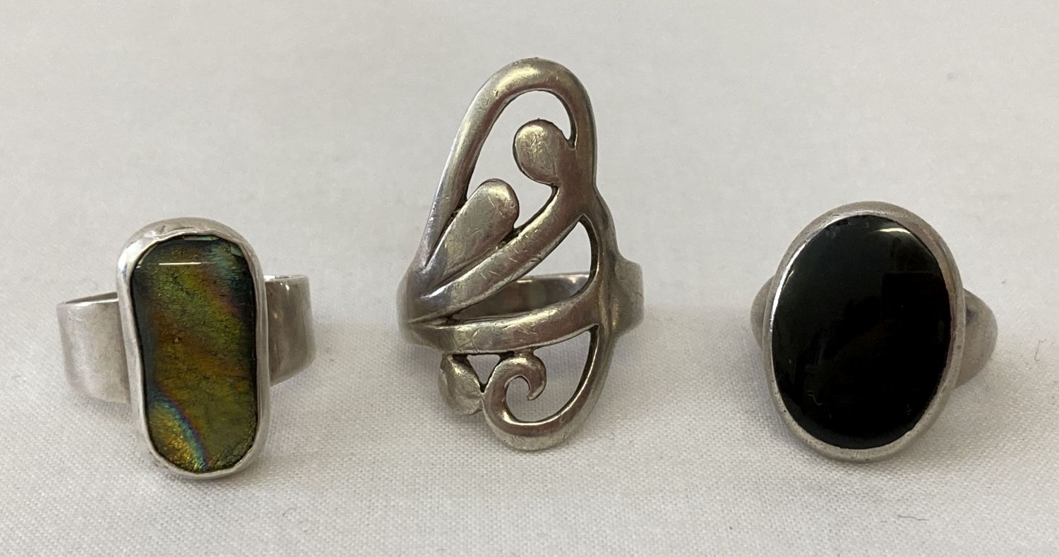 3 silver modern design rings.