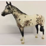 A Beswick ceramic Appaloosa Stallion, model #1772B, in colourway No. 2.