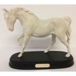 Royal Doulton "Spirit of Freedom" ceramic horse figurine, on black wooden plinth, model #DA58B.
