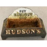 A heavy cast iron advertising Hudson's Soap "Drink Puppy Drink" dog water trough.