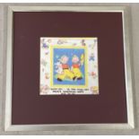 A framed and glazed vintage Mabel Lucy Attwell children's handkerchief depicting twins with a dog,