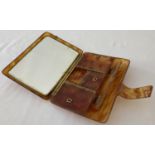A vintage faux tortoise shell carry all vanity clutch bag with interior accessories.