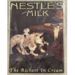 A metal Nestlé's Swiss Milk advertising sign.