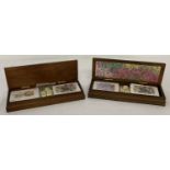 2 wooden cased sets of playing cards and dice.