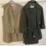 A vintage 1970's tunic trouser suit in dark green by Lerose, complete with original hanger.