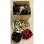 A box of assorted vintage ladies faux fur hats.