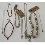 A Collection of vintage necklaces to include statement necklaces and silver examples.