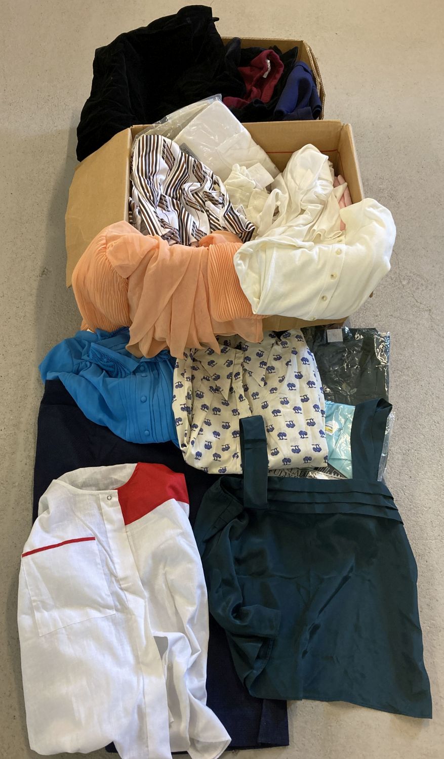 2 boxes of vintage clothes, some in original packaging.