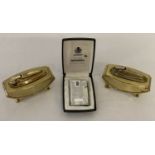 2 Ronson table lighters together with a boxed Varaflame Ronson lighter in silver tone.