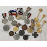A quantity of assorted Royal Commemorative and coronation related medals, coins and spoons.