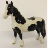 A Beswick ceramic Piebald (black & White) Pinto pony figurine.