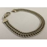 A silver S link chain bracelet with lobster style clasp. Approx. 8.5 inches long.