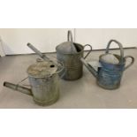 3 vintage galvanised watering cans.