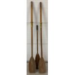 3 vintage wooden rowing oars. A pair with yellow plastic grips by Estuary Marine.