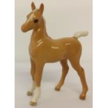A Royal Doulton ceramic Arab foal in gloss Palomino colourway, model #DA80.
