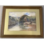 A gilt framed and glazed watercolour of a rural landscape with cattle and castle by R. Harris.