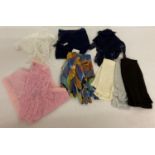 A quantity of vintage 1980's lace scarves and gloves to include matching sets.