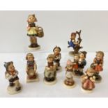 10 Goebel ceramic Hummel figurines, some a/f.