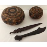 A small collection of vintage carved ethnographic items.