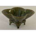 A small ceramic 4 footed quatrefoil shaped censer with unusual striped green glaze.