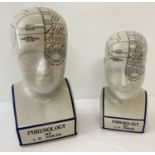 2 ceramic L.N. Fowler phrenology heads.