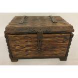 A vintage dark wood, metal banded, 2 handled chest.