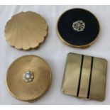 A Collection of 4 vintage compacts in gold tone and black colourways.