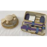 A vintage dressing table top Bakelite vanity set of cosmetic pots by Chic-pak.