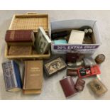 A box and small picnic basket full of mixed vintage items.