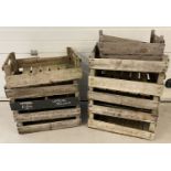 A collection of 11 vintage wooden garden/vegetable crates some with growers /manufacturers names.