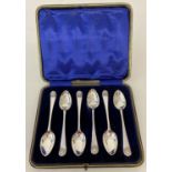 A cased set of vintage silver plate teaspoons with classic scallop shell design to handles.