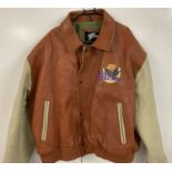 A vintage brown and cream leather "Planet Hollywood" bomber jacket.