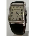 A men's square face wristwatch by Emporio Armani. With original black leather strap.